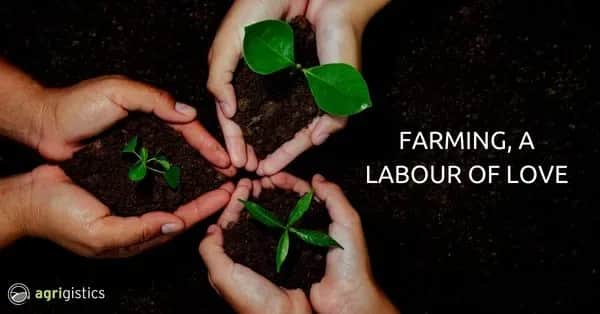 Hands holding soil and young plants arranged in a heart shape with text reading Farming, a labour of love